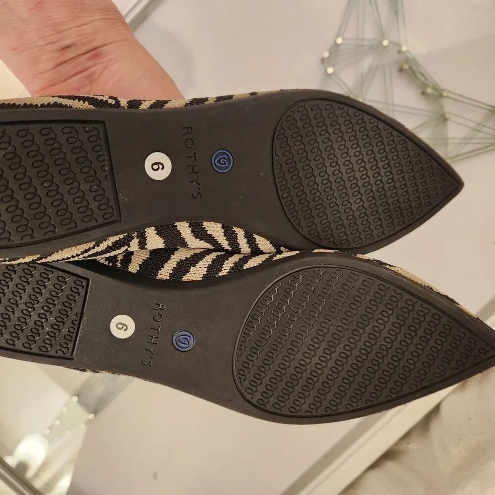 Rothy's Black/Cream Zebra Point toe flats. NWT. Size 6